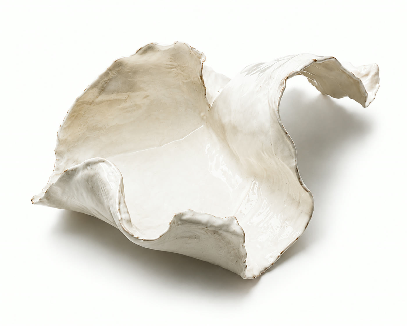 White glazed vessel folding like a wave